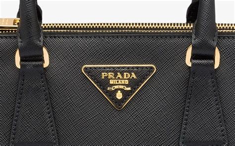 how to spot a fake prada messenger bag|prada dust bag authentic.